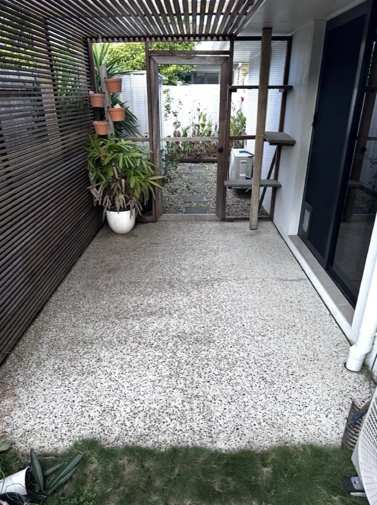 The same patio floor clean and even after pressure washing